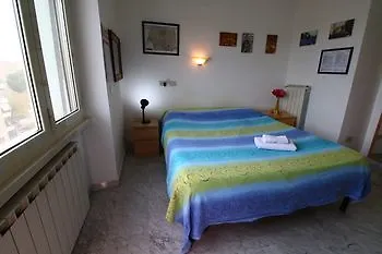 Maria Grazia *